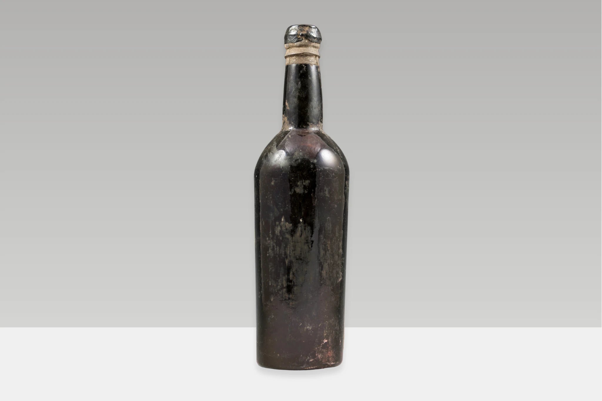 A historic bottle of Port wine from the late nineteenth century, showcasing one of Portugal’s most enduring winemaking traditions.
