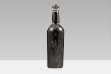A historic bottle of Port wine from the late nineteenth century, showcasing one of Portugal’s most enduring winemaking traditions.