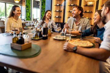 A seamless dinner-party flow: start with bubbles, move through crisp and creamy whites, offer versatile reds, and end with a sweet or fortified wine for a memorable final sip.