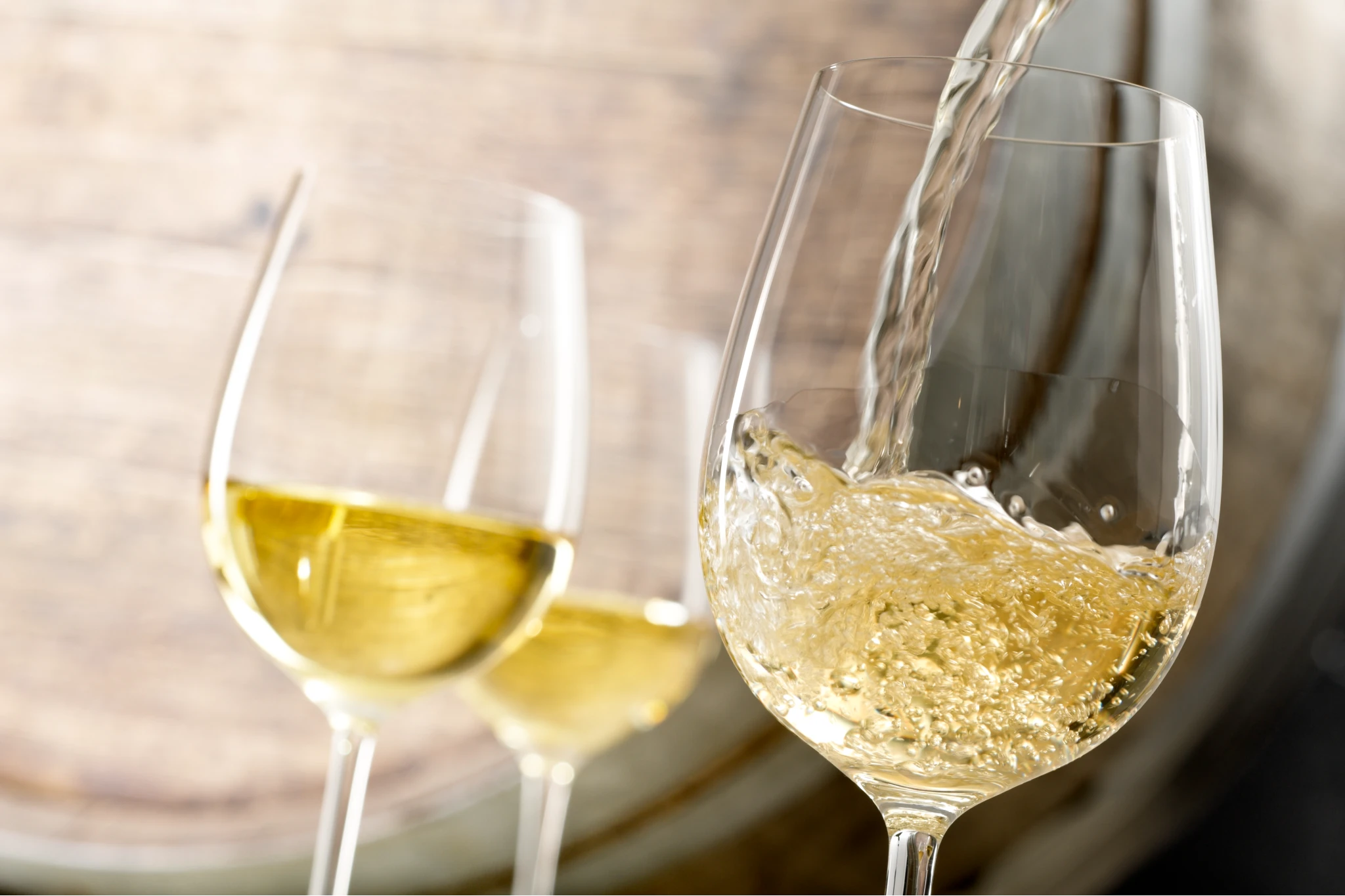 White wine glass with a smaller, more tapered bowl that preserves freshness and highlights delicate aromas. Its shape maintains cooler temperatures and enhances the crispness and purity of wines such as Sauvignon Blanc, Chardonnay, and Riesling.