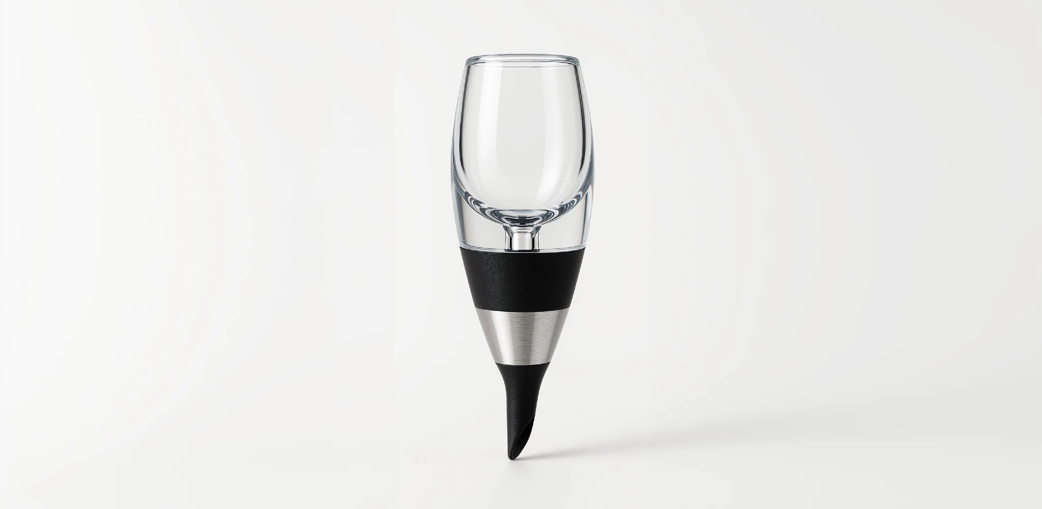 Place the aerator over the glass and pour the wine through it; the device mixes air with the wine instantly for faster aeration.