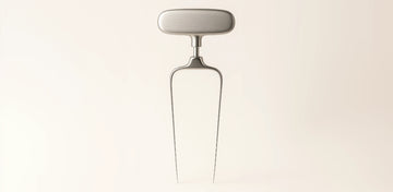 Use the Ah-So to remove delicate or older corks by sliding the two prongs between the cork and the bottle neck, then twisting gently to lift it out.