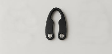 Place the foil cutter over the bottle’s neck, squeeze gently, and rotate to remove the capsule cleanly in one motion.