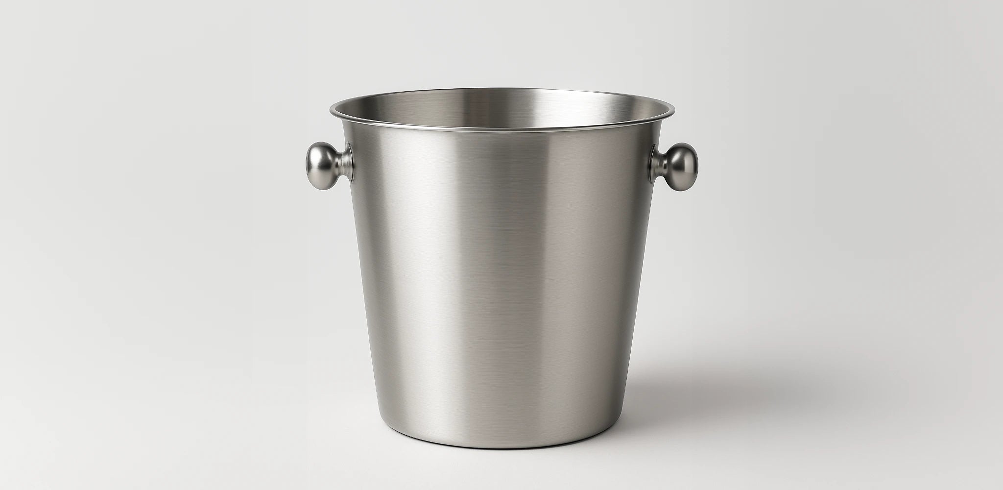 Fill the bucket with ice and water, then submerge the bottle to chill it quickly and evenly before serving.