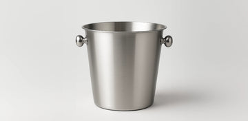 Fill the bucket with ice and water, then submerge the bottle to chill it quickly and evenly before serving.