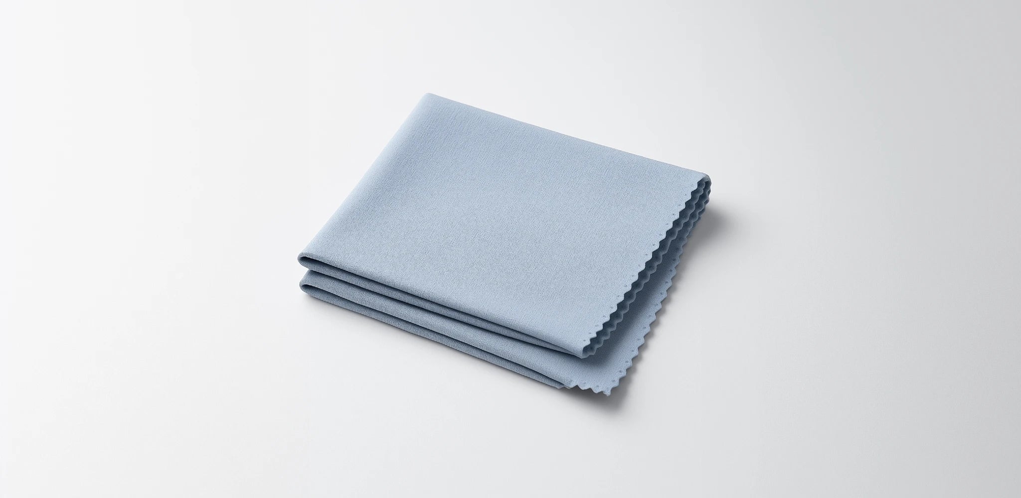 Use a microfiber polishing cloth to remove streaks and water marks, ensuring crystal-clear glassware before serving wine.