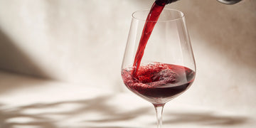 Elegant reds with soft tannins, bright acidity, and vibrant red fruit, often served slightly chilled.