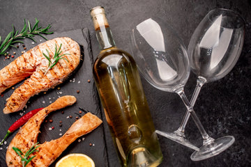 Fatty fish like salmon or toro find perfect balance with fuller whites or light, silky reds that refresh the palate and complement their rich texture.